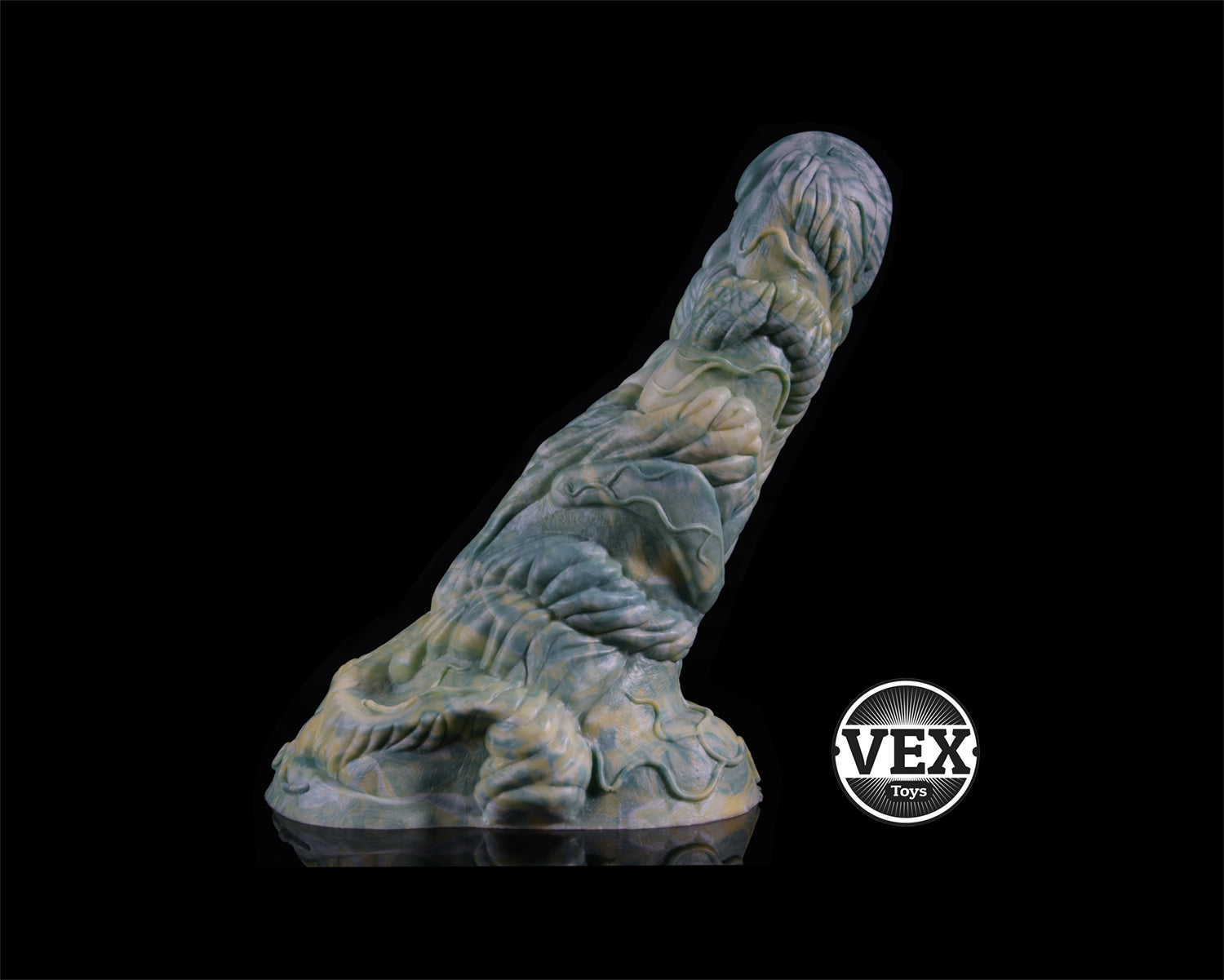 Textured, greenish-brown object resembling a creature on a black background with 'VEX Toys' logo.